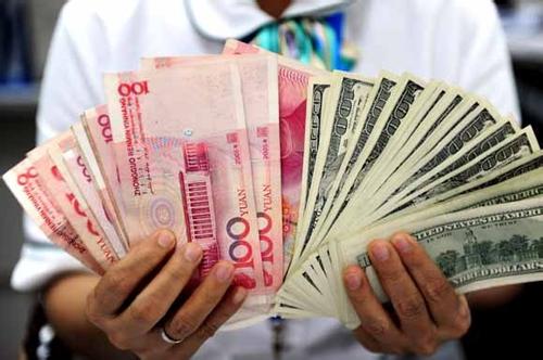 人民币兑美元中间价下调52个基点 报6.6399